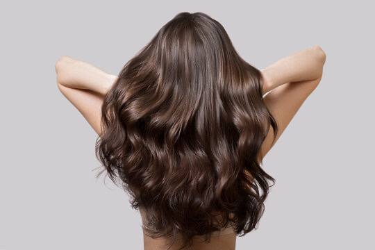 women flaunting her hair at silent moment hair salon